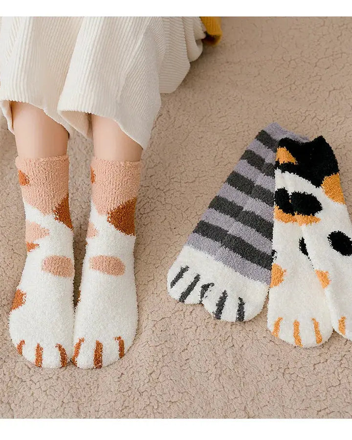Cozy cat claw socks in action