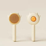 Cat using a needle comb for grooming