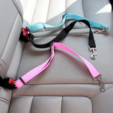 Adjustable Cat Car Seat Belt in pink and blue, securely fastened to a car seat. Durable and safe design ensures cat safety during travel.